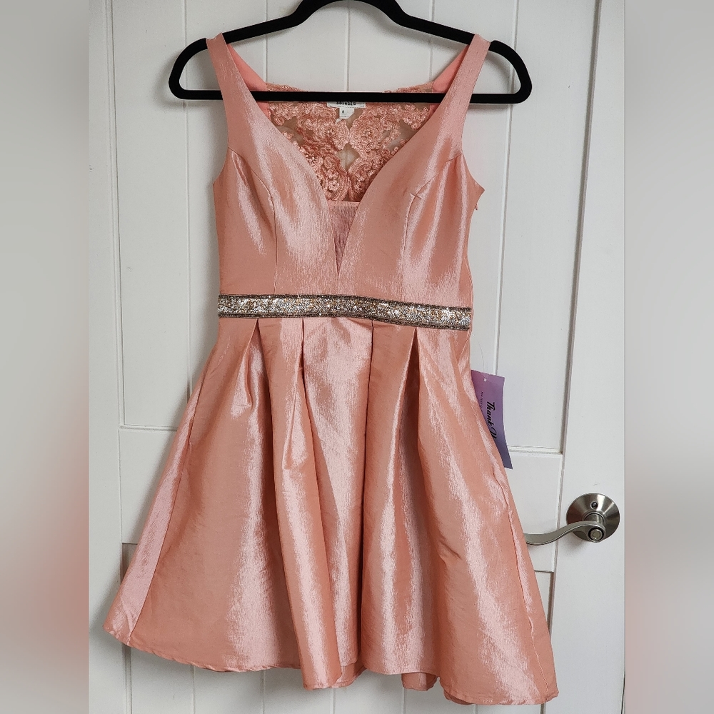Beautiful peach formal dress with rhinestone accent belt